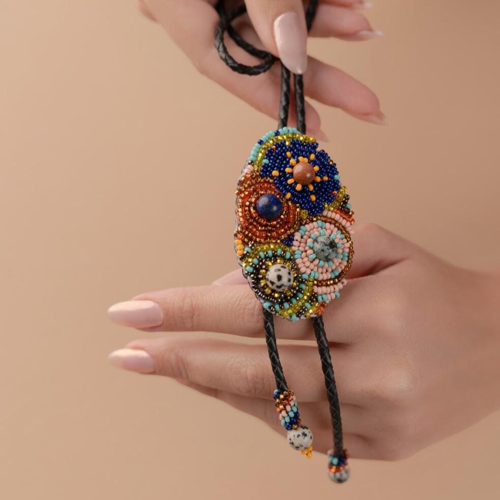 bourbon cowgirl Bolo Tie blue red gold pink textured beaded necklace beaded native american jewelry mexico guatemala handmade accessory aglets slide clasp