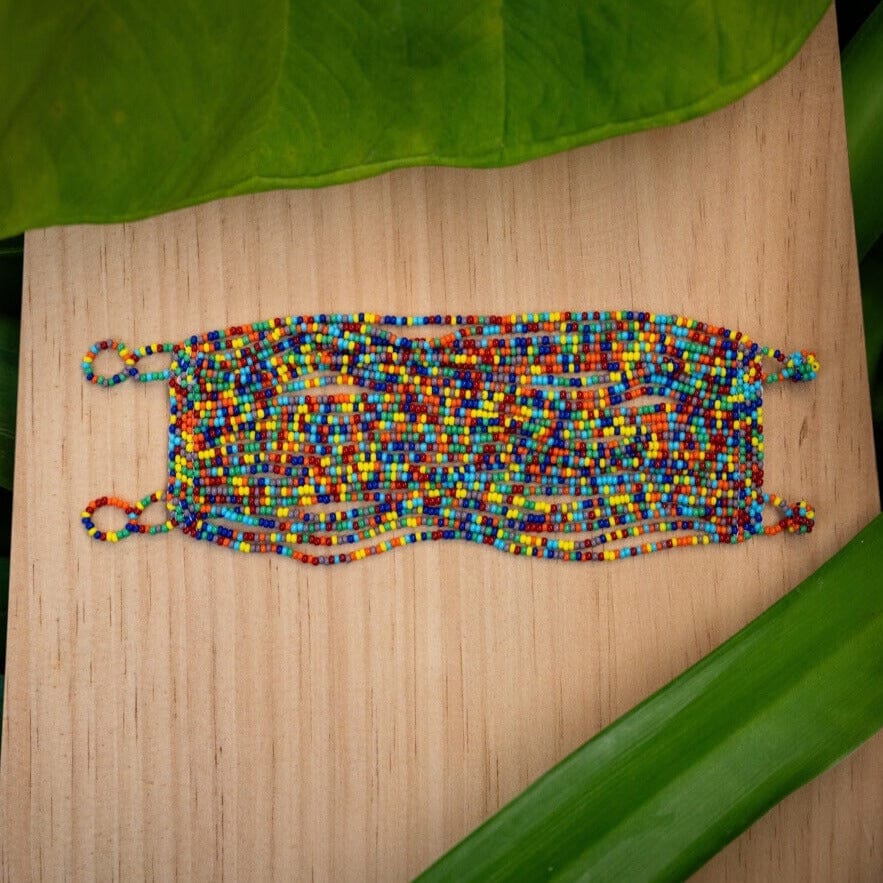 Handmade Fiesta Fusion rainbow beaded cuff bracelet by Mother Sierra.