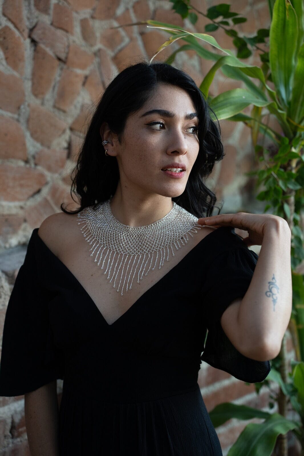 woman wearing Frozen Ice Eyelet beaded choker fringe Necklace silver native american jewelry Mother Sierra