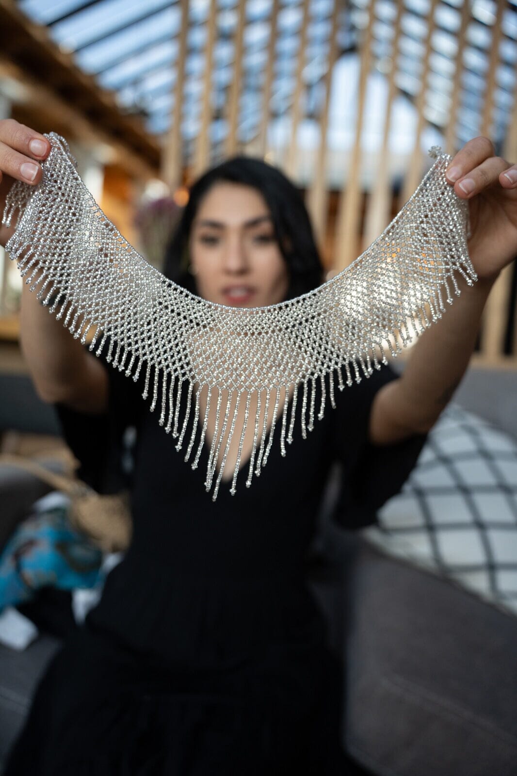 woman holding Frozen Ice Eyelet beaded choker fringe Necklace silver native american jewelry Mother Sierra
