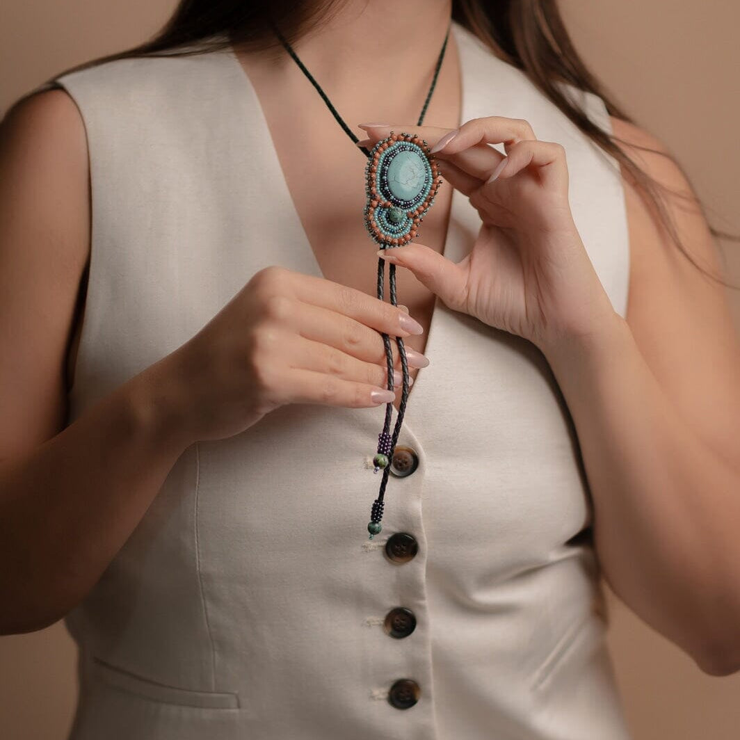 rio bravo Bolo Tie blue turquoise brown textured beaded necklace beaded native american jewelry mexico guatemala handmade accessory aglets slide clasp