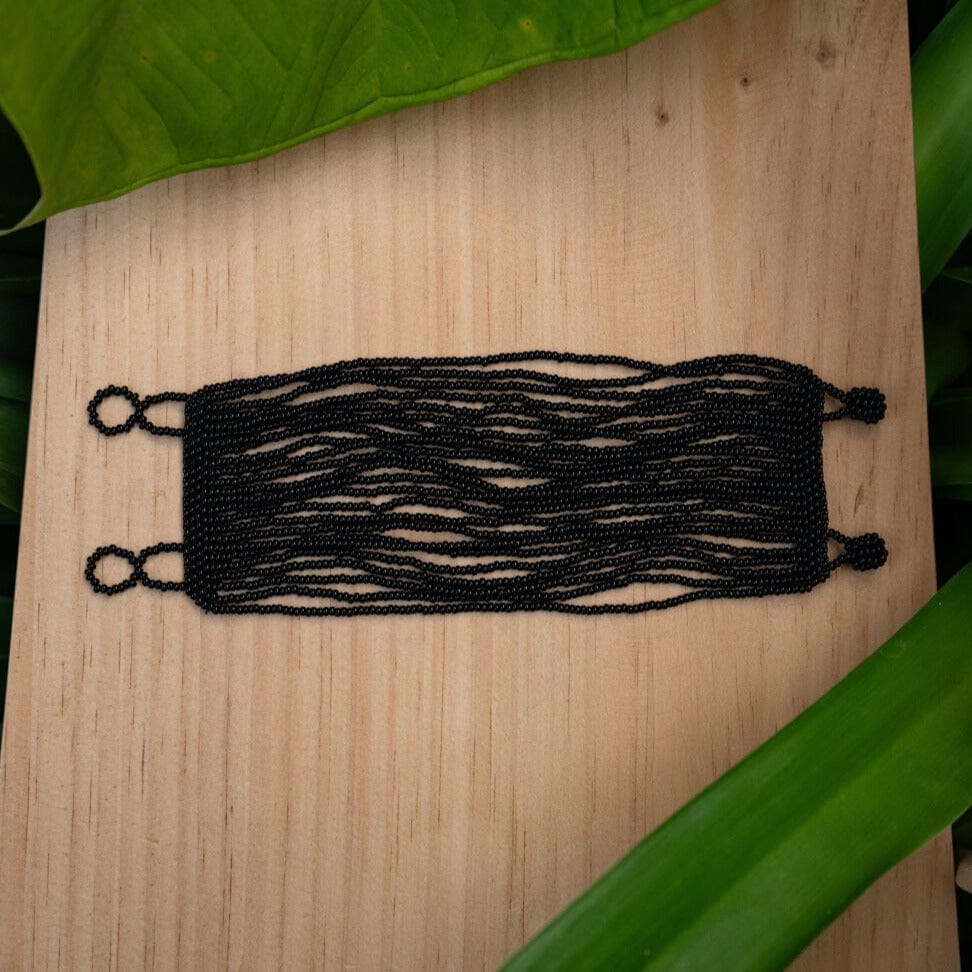 Handmade Shadow Essence beaded bracelet in black, featuring a multi-strand cuff design with native American jewelry by Mother Sierra.