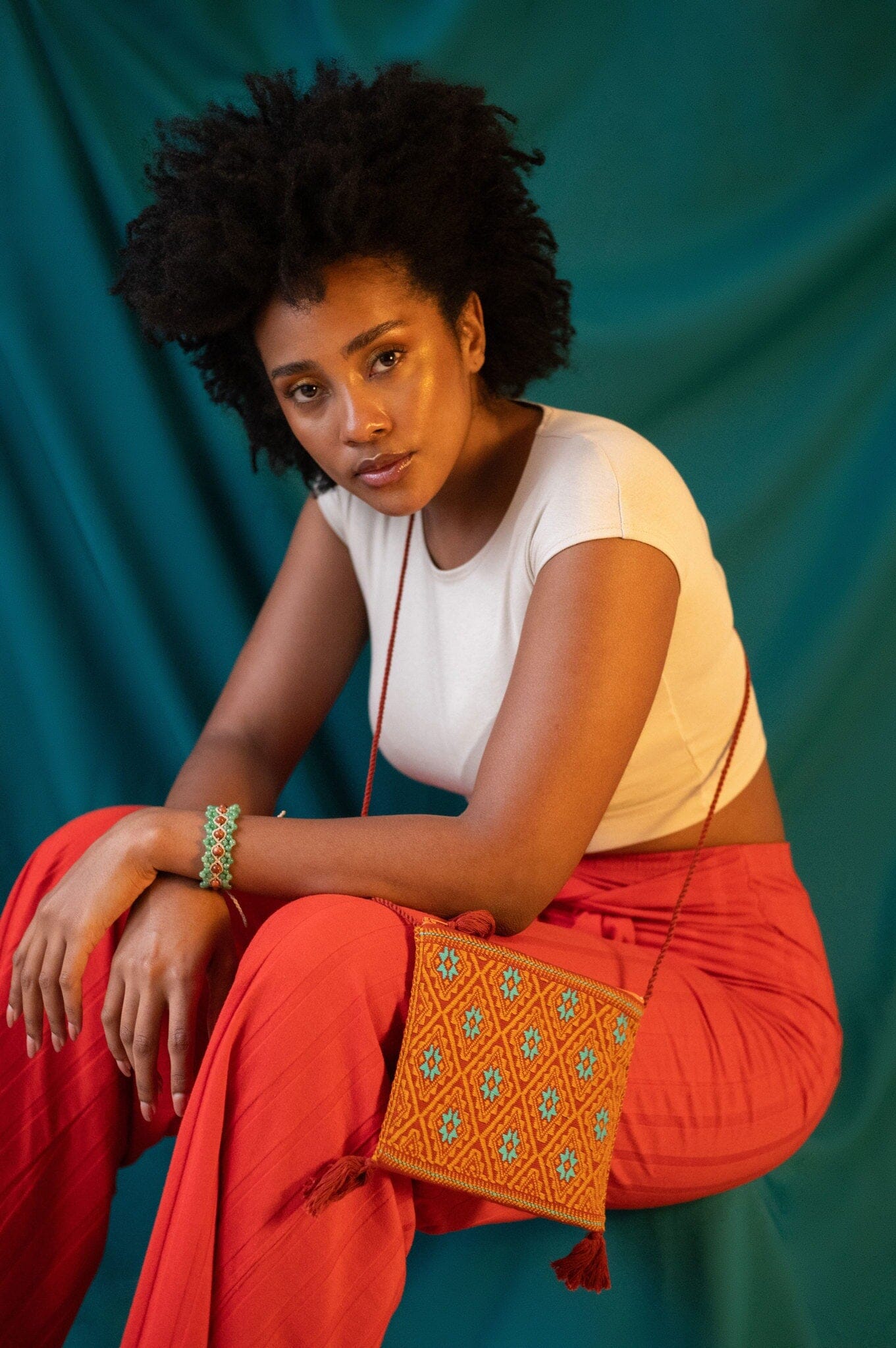 woman wearing Sweet Pea Macrame Bracelet bracelet Mother Sierra handmade teal beige orange green jewelry