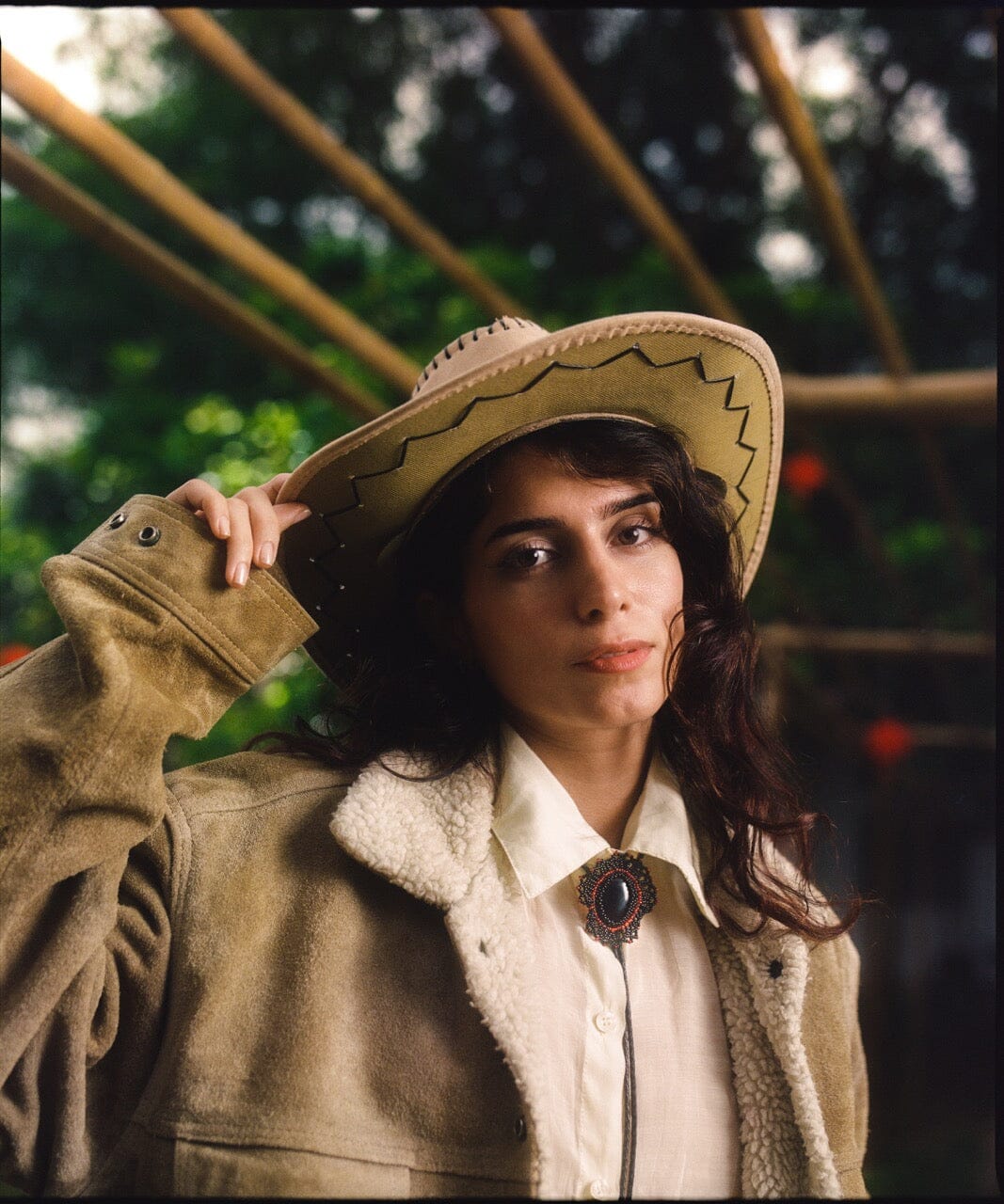 woman wearing Black Rose Bolo Tie black red close up necklace beaded native american jewelry