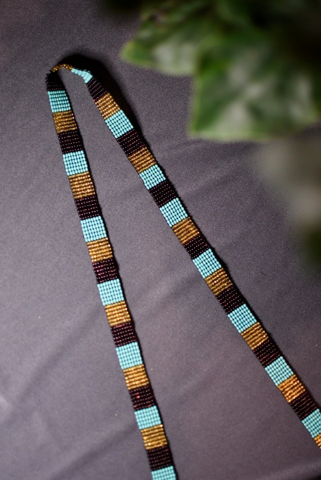 strap close up teal gold brown ripple effect beaded purse bag fringe