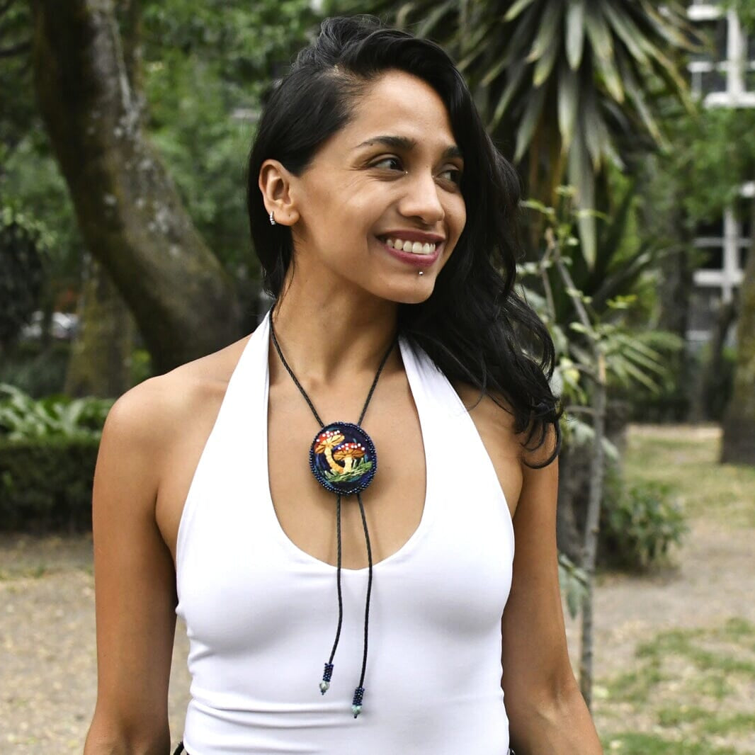 Woman Wearing Briar Patch Embroidered Mushroom Beaded Bolo Tie Necklace Necktie