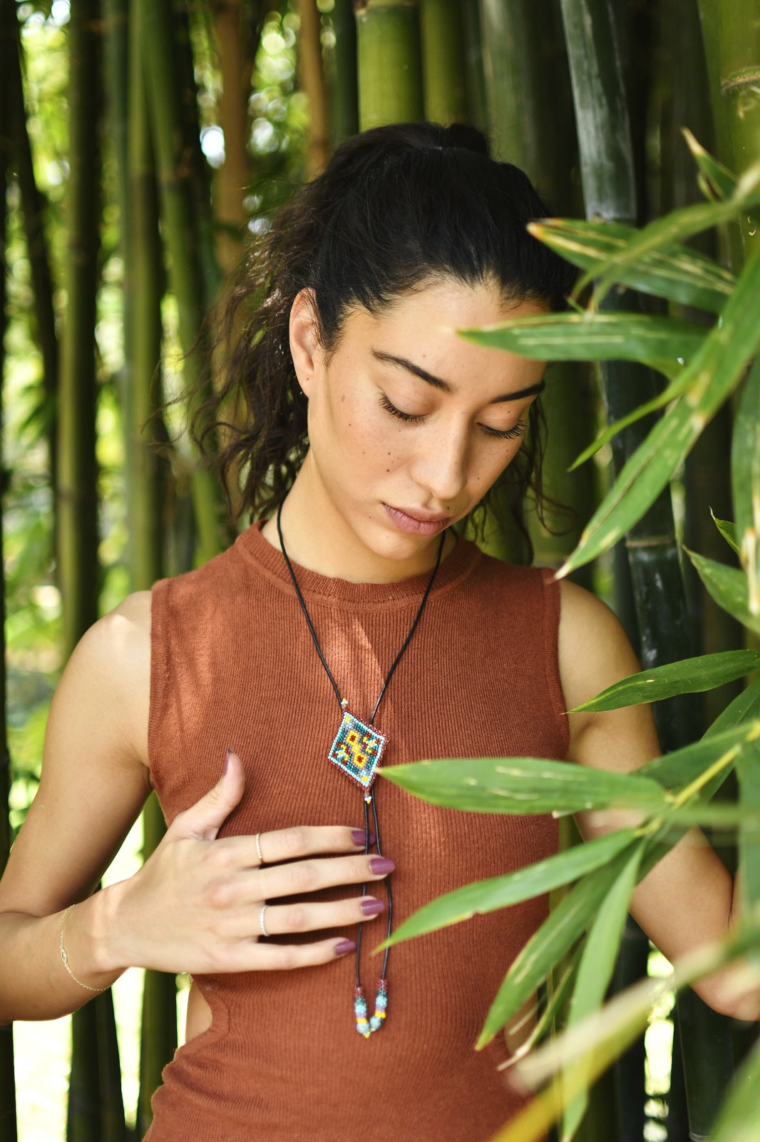 Woman Wearing a Handmade Diamond Spur Beaded Bolo Tie Necktie Necklace