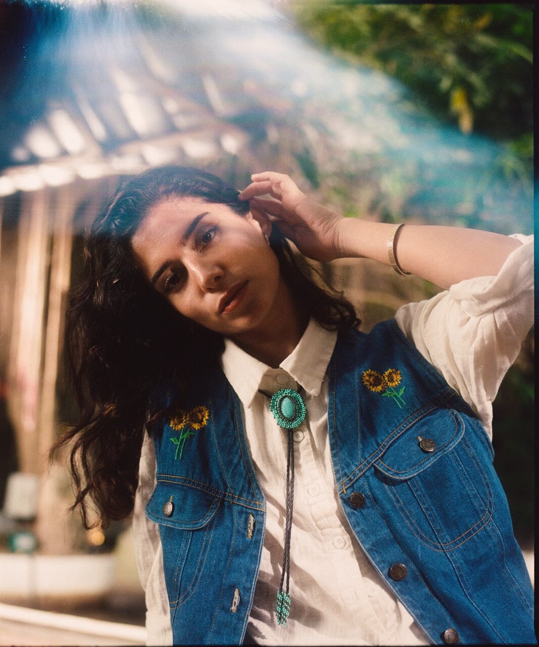 woman wearing eilat stone turquoise beaded Bolo Tie necklace necktie native american jewelry