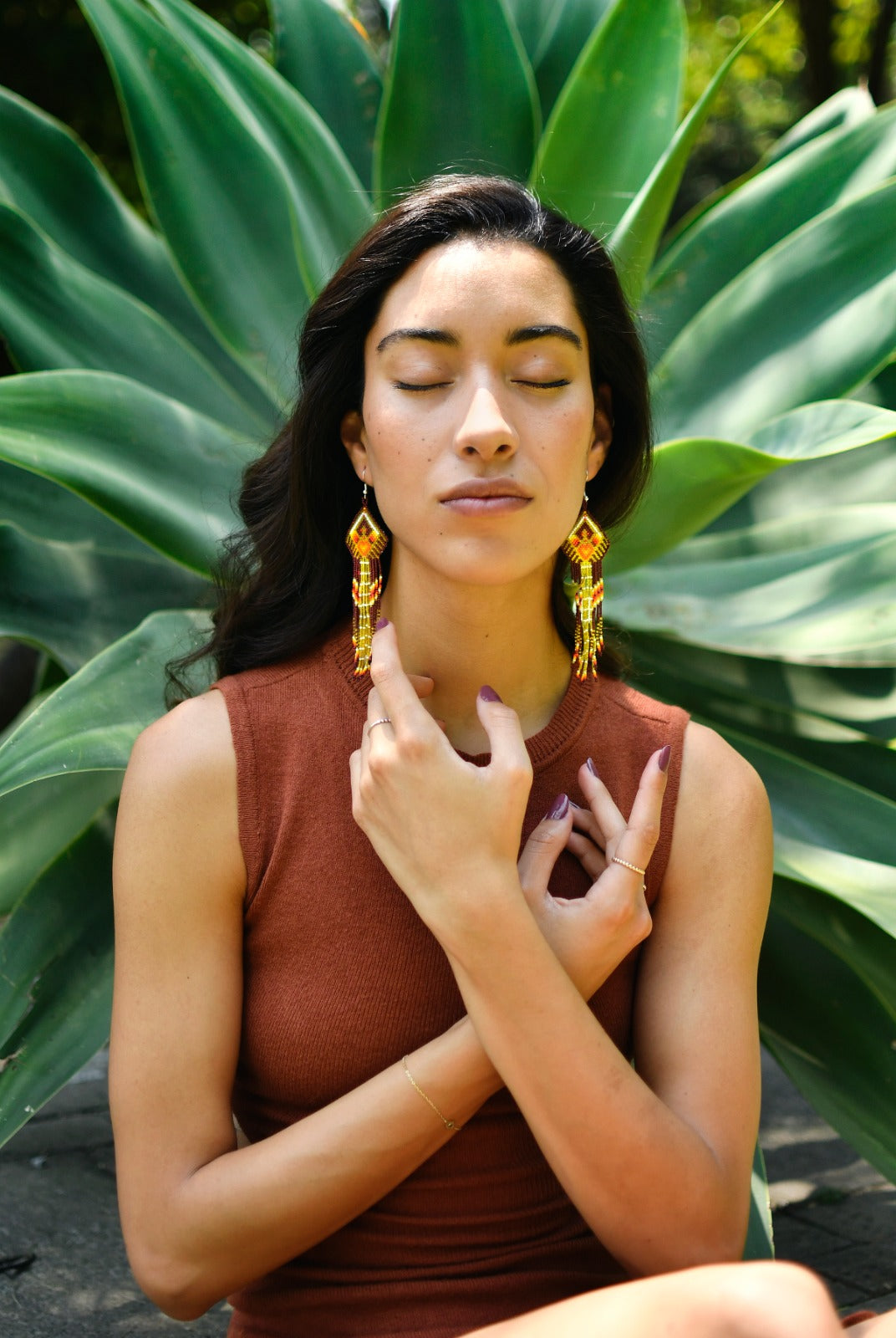 Woman Wearing Golden Brown Fringe Native American Handmade Beaded Earrings