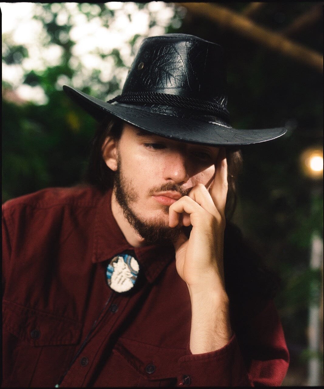 Man Wearing Lobo Wolf Embroidered Beaded Handmade Bolo Tie Necklace Necktie by Mother Sierra