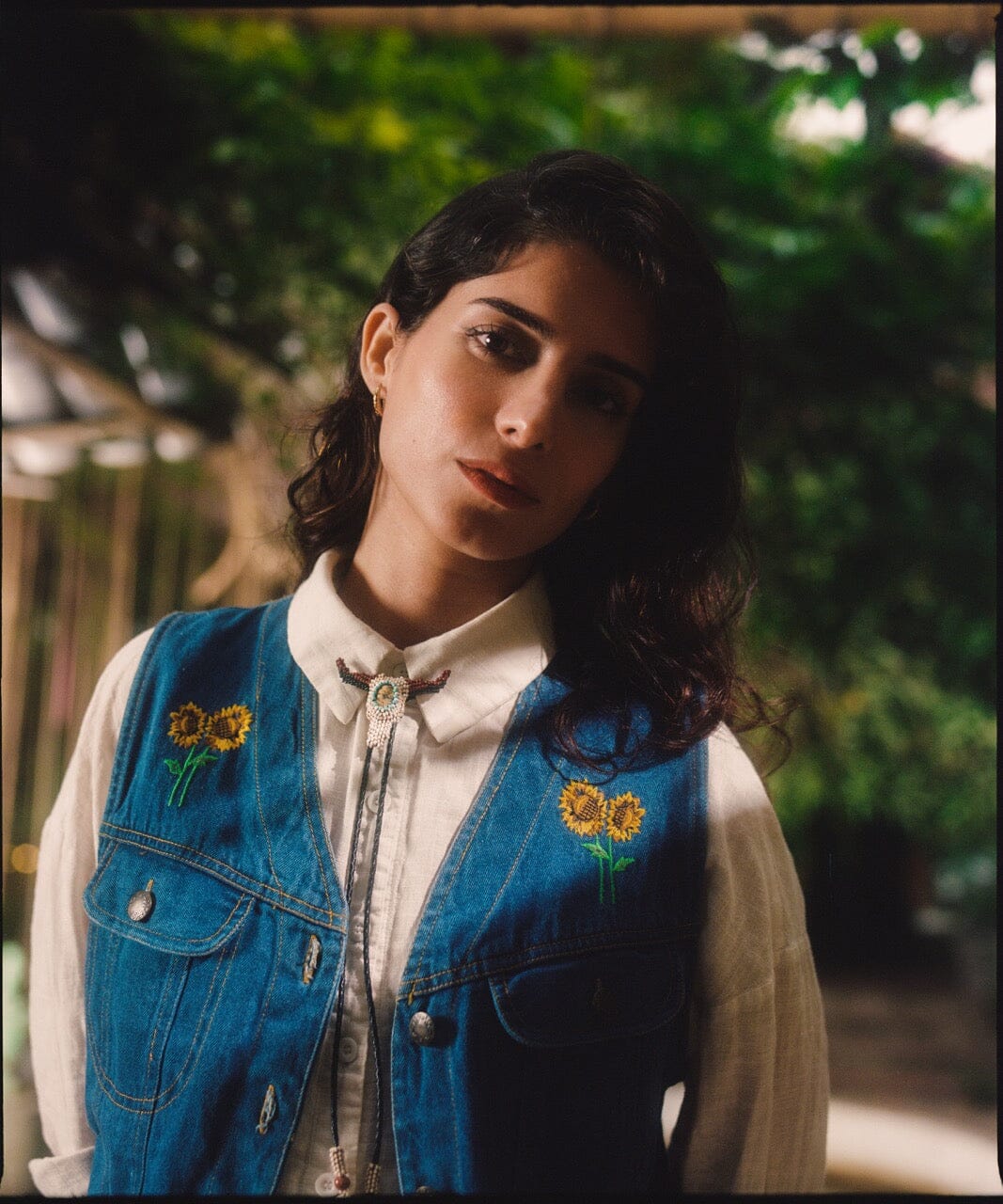 Woman Wearing Longhorn Handmade Beaded Bolo Tie White Skull Necktie Necklace