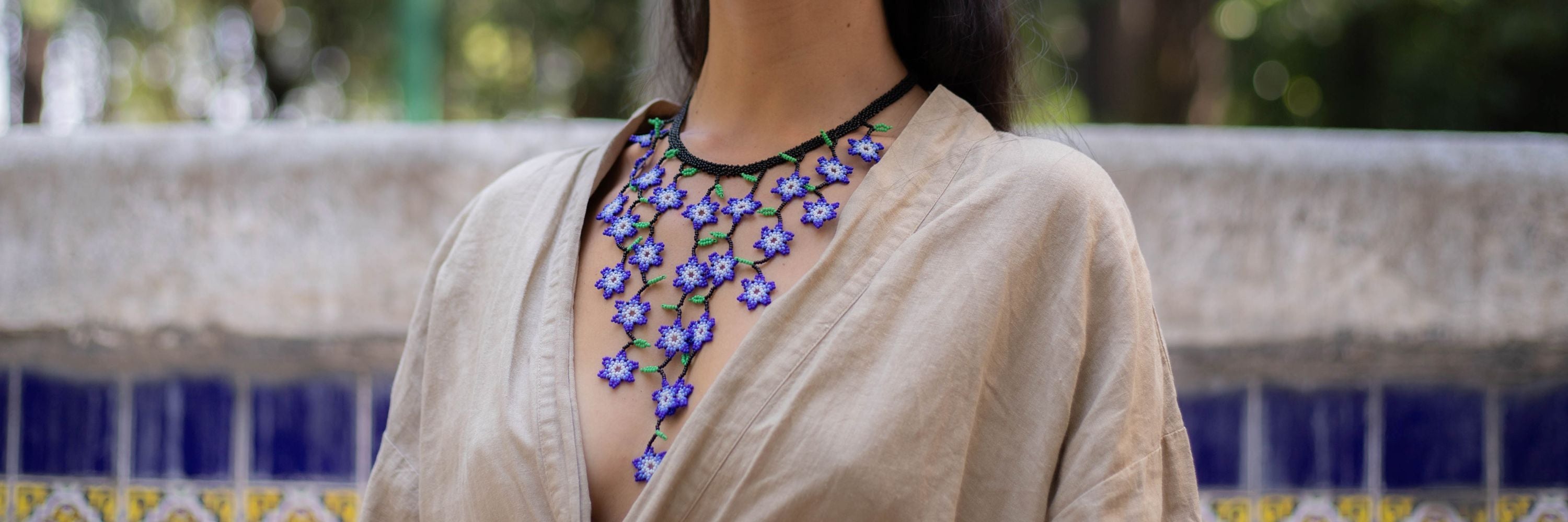 Detailed beaded necklace designs handmade by artisans