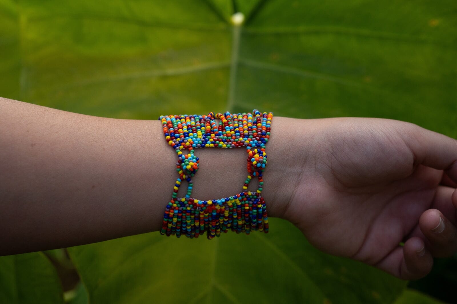 Handmade Fiesta Fusion rainbow beaded bracelet cuff by Mother Sierra.