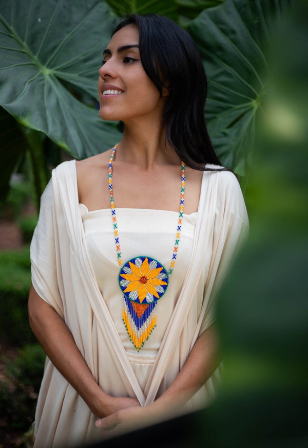 woman wearing girasol blue silver yellow green beaded necklace pouch medicine bag fringe native american jewelry
