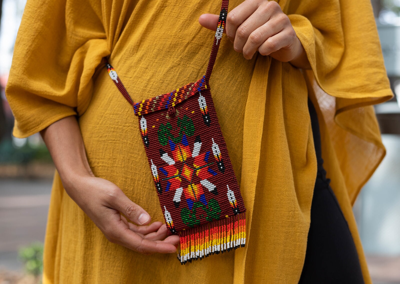 Artistic handmade beaded sling bags by Mother Sierra