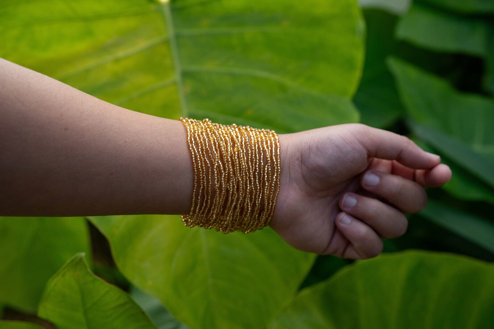 Majestic Honey handmade beaded multi-strand bracelet cuff in gold, featuring native American jewelry by Mother Sierra.