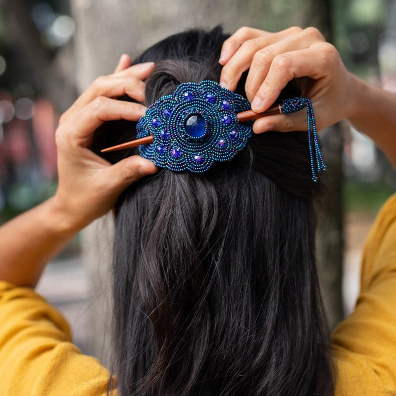 woman wearing midnight steel blue beaded hair barrette and pin statement piece native american jewelry