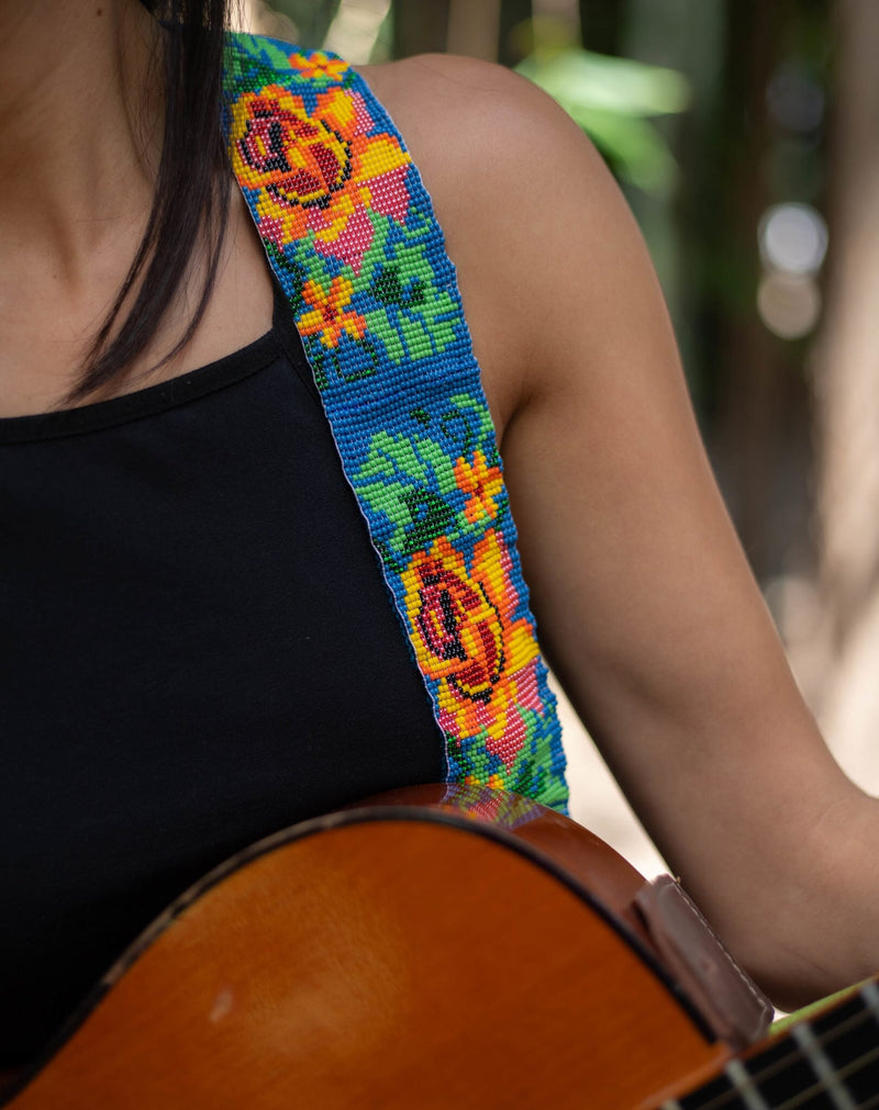close up Texas Rose beaded Guitar Strap blue pink yellow green adjustable leather on guitar