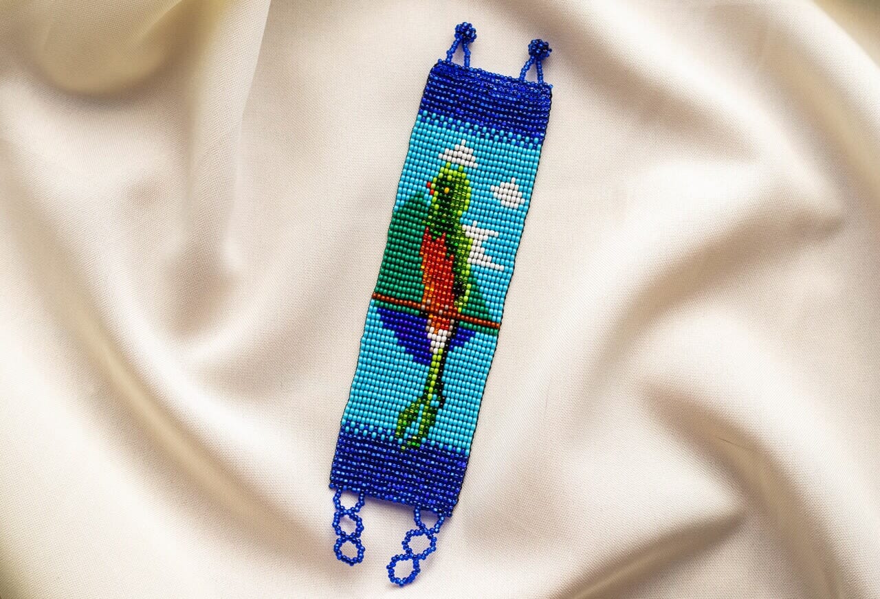 Amazoni bird and sky green blue handmade beaded bracelet cuff