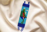 Amazoni bird and sky green blue beaded bracelet cuff