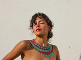 woman wearing jade green teal gold brown beaded choker necklace fringe native american jewelry