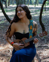 woman wearing Marietta beaded Guitar Strap yellow orange green blue black adjustable leather on ukulele 