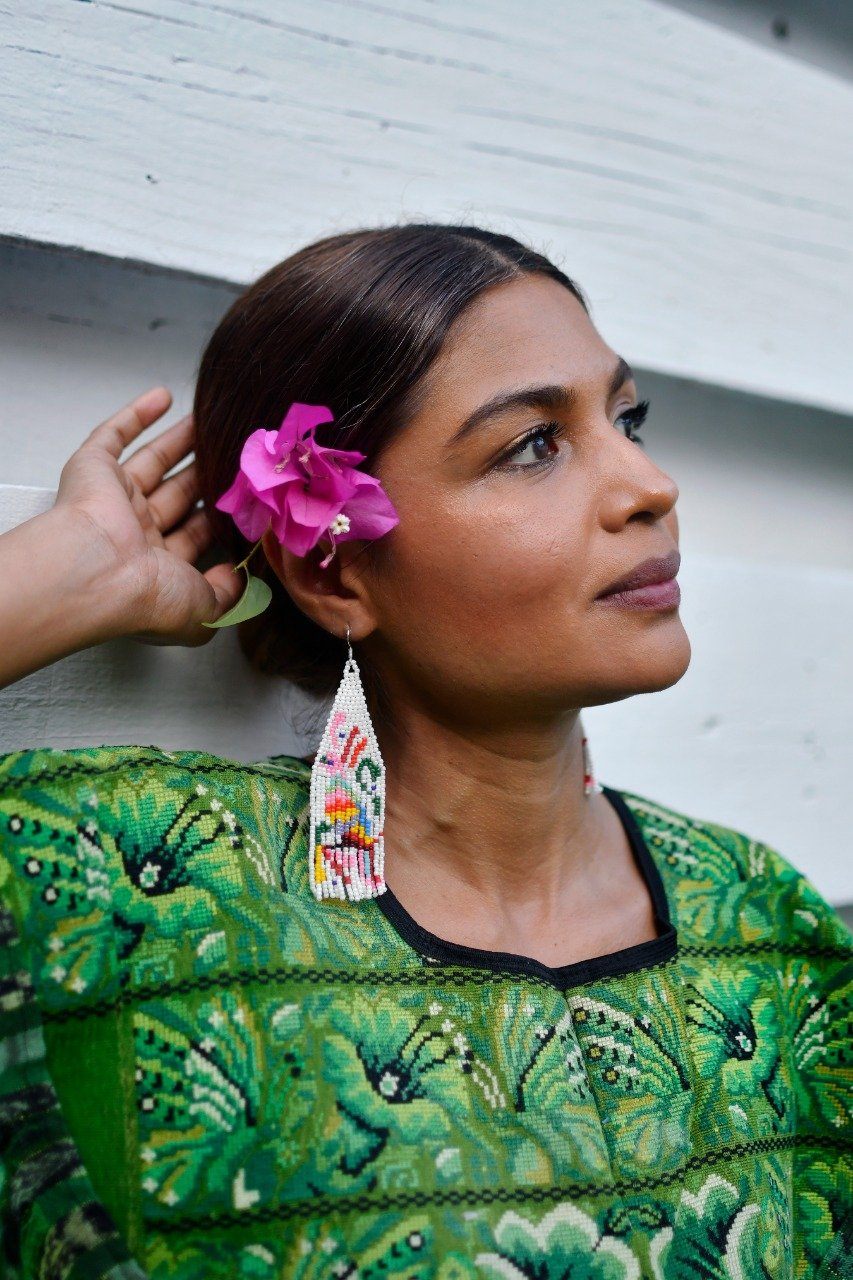 Woman Wearing Otomí Colorful Bright Tenango Fringe Handmade Beaded Earrings by Mother Sierra