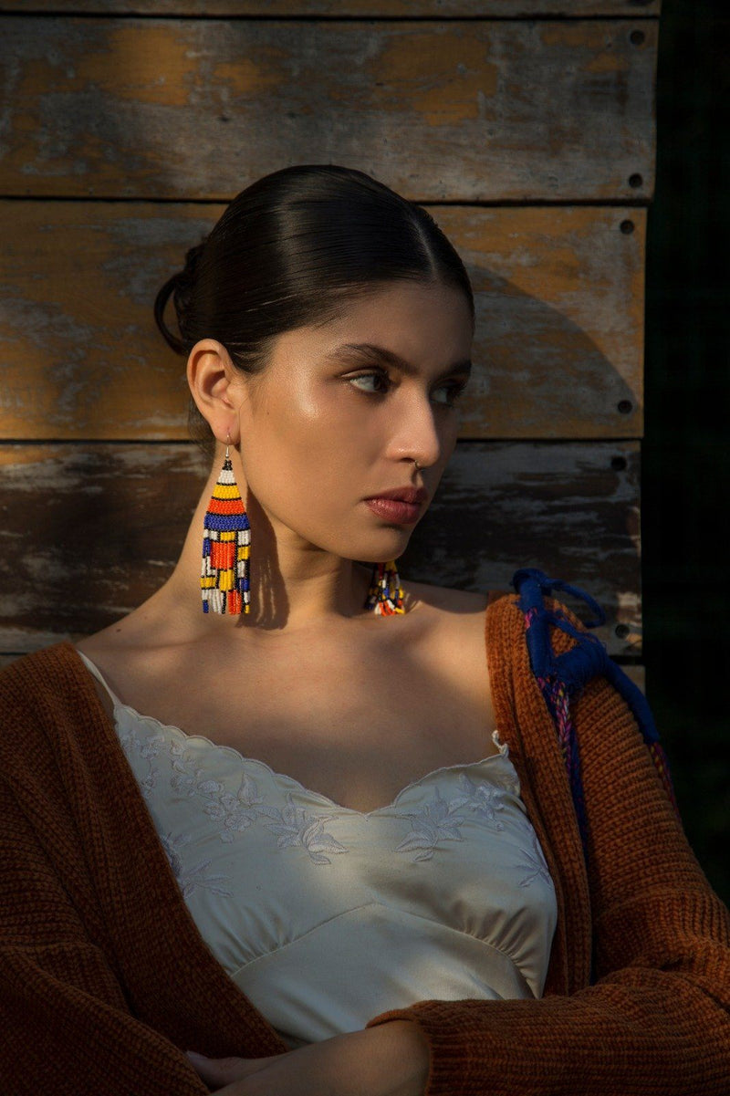 woman wearing Piet mondrain Blocks colorful fringe beaded earrings